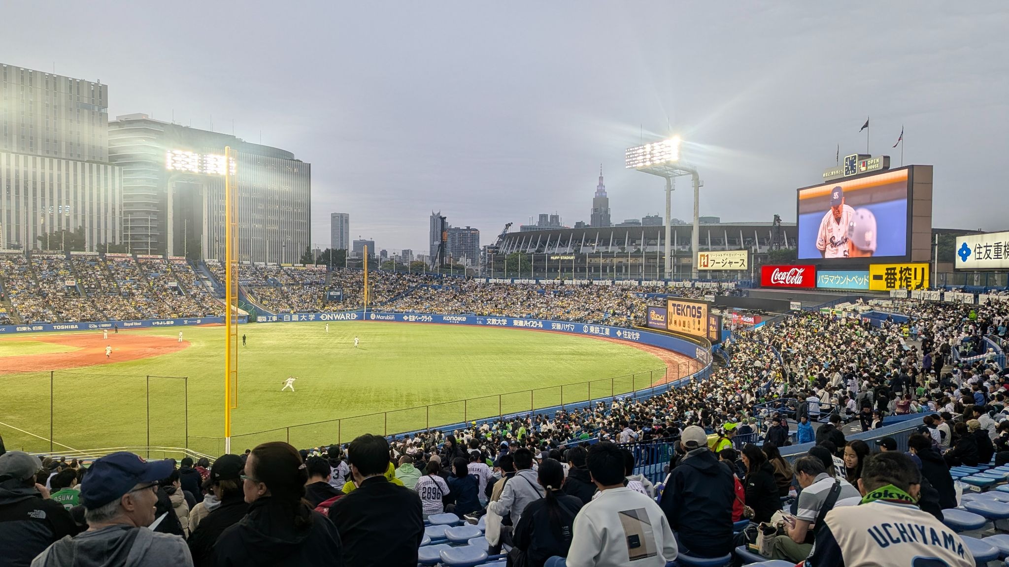 Ongoing game between Tokyo Yakult Swallows and Hanshin Tigers at Meiji Jingu Baseball Stadium